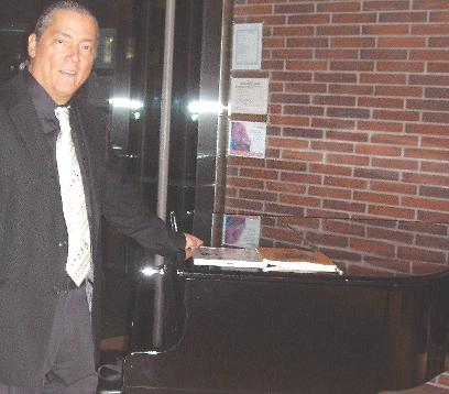 Teo Vincent IV at RCM Royal Conservatory Of Music Lobby Grand Piano showing his Music Books, smiling, white music tie