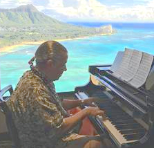 Theodore Teo Barry Vincent IV, Exceptional Pianist at Sheritan Leahi Lounge, Honolulu, Hawaii, USA. You can see the Leahi - peak of 